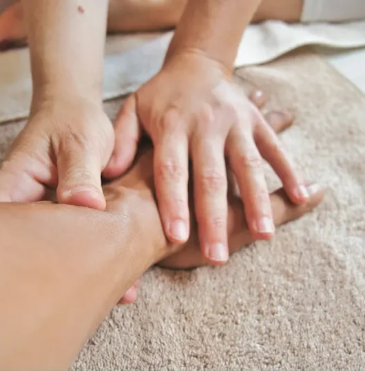 Gentle hand reflexology treatment