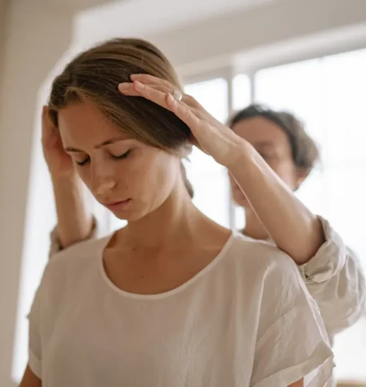 Woman relaxing with her hand on her head